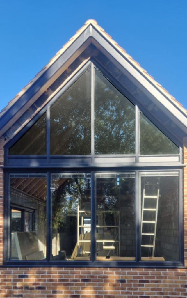 Anthracite Aluminium Shaped Frame and Glass installation on house gable