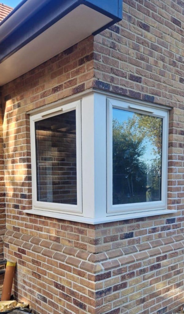 Cream uPVC Window installed on the corner of a house in Lincolnshire