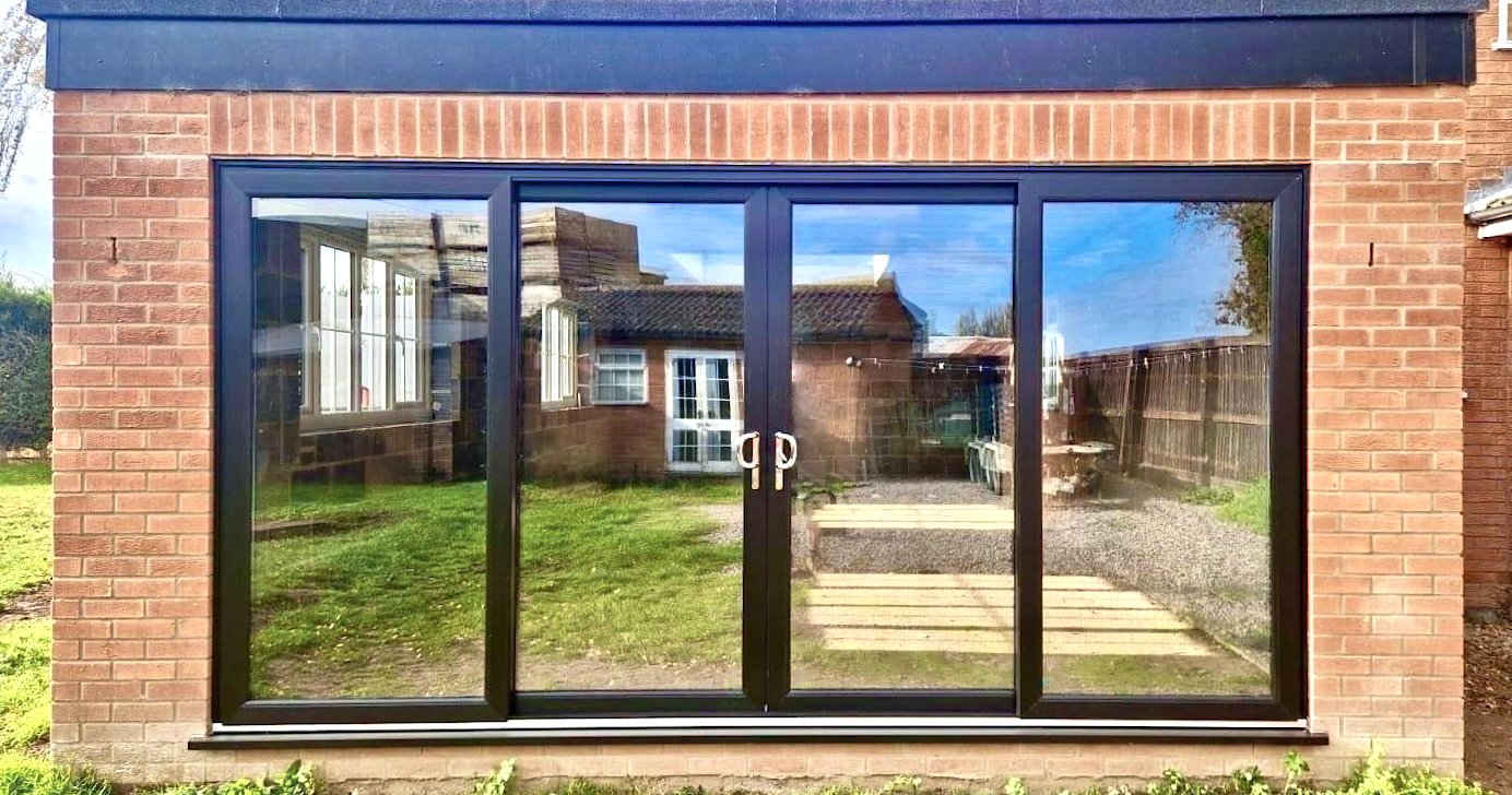Four Pane Patio Slider with Central sliding Doors installed in Surfleet, Lincolnshire