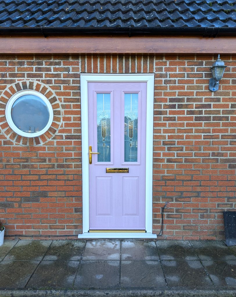 Pink Composite Door and Circle Window installed on a Home in Kirton, Lincolnshire