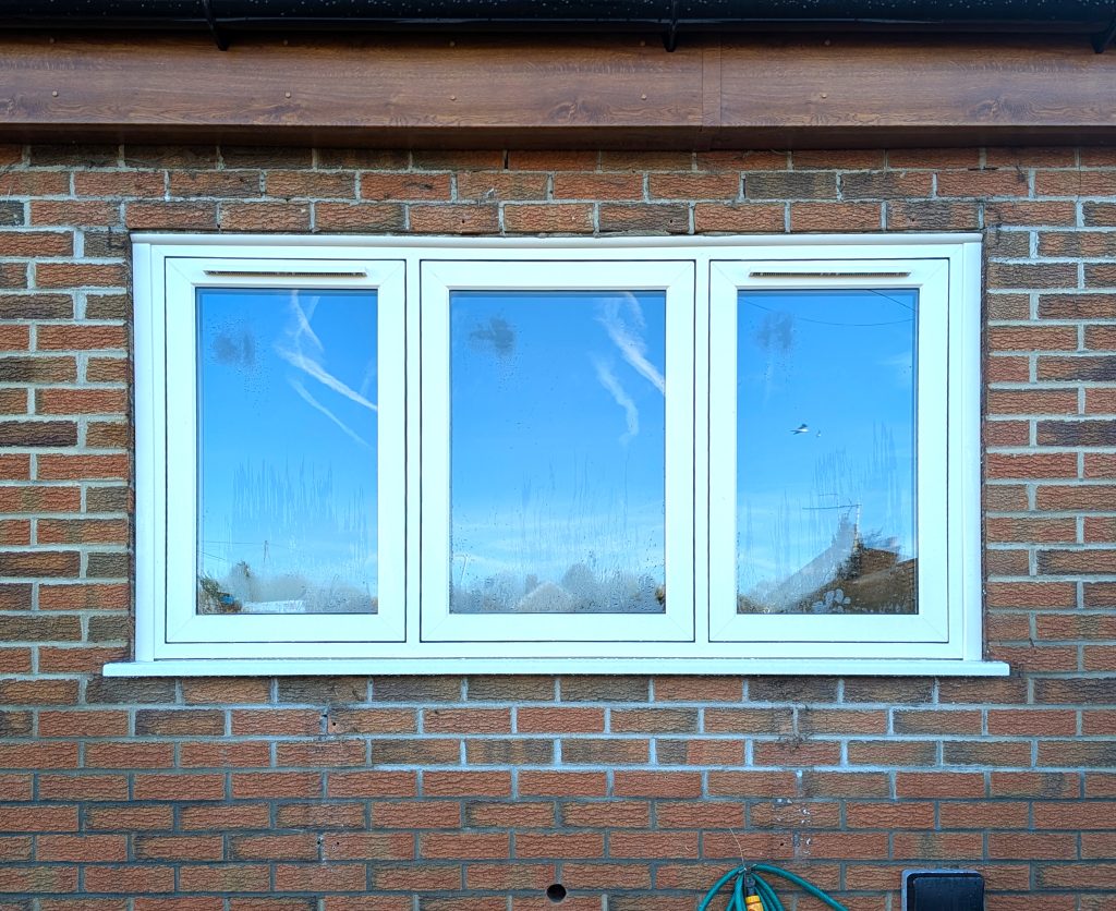 Flush, Cream Casement uPVC Windows and Golden Oak Fascia installed on a home in Kirton, Lincolnshire